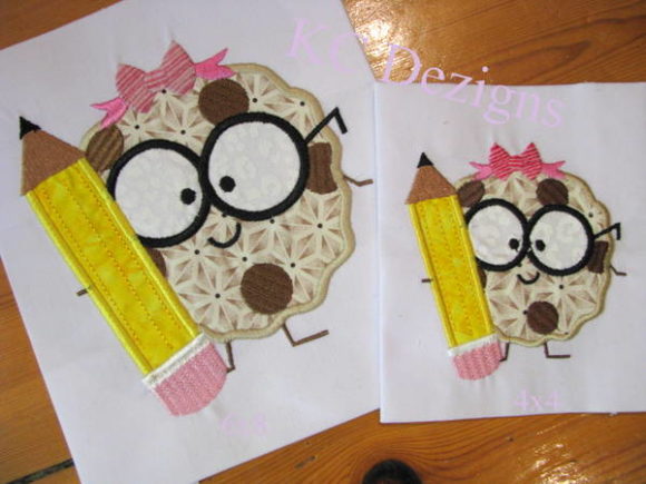 Girl Cookie with Pencil: A Sweet Embroidery Design for Personalized Gifts